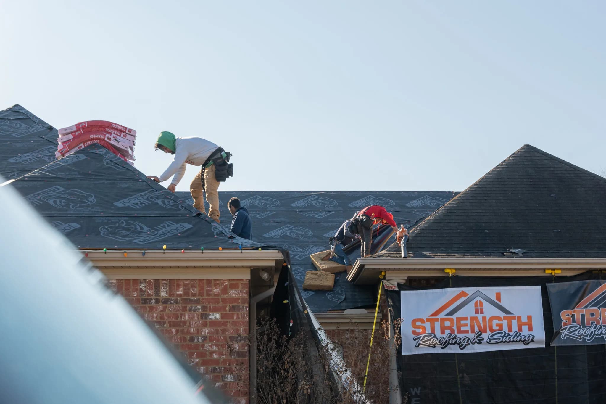 New shingle roof installed by Strength Roofing & Siding