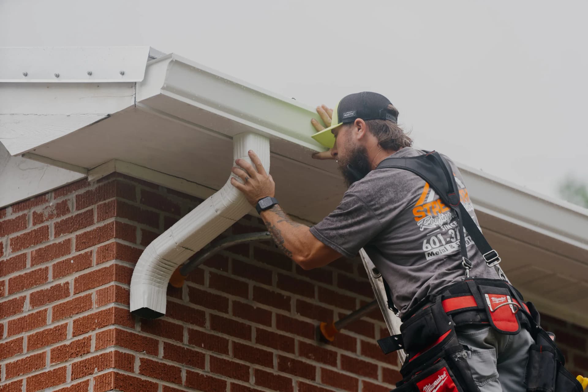 Seamless gutters installed by Strength Roofing & Siding